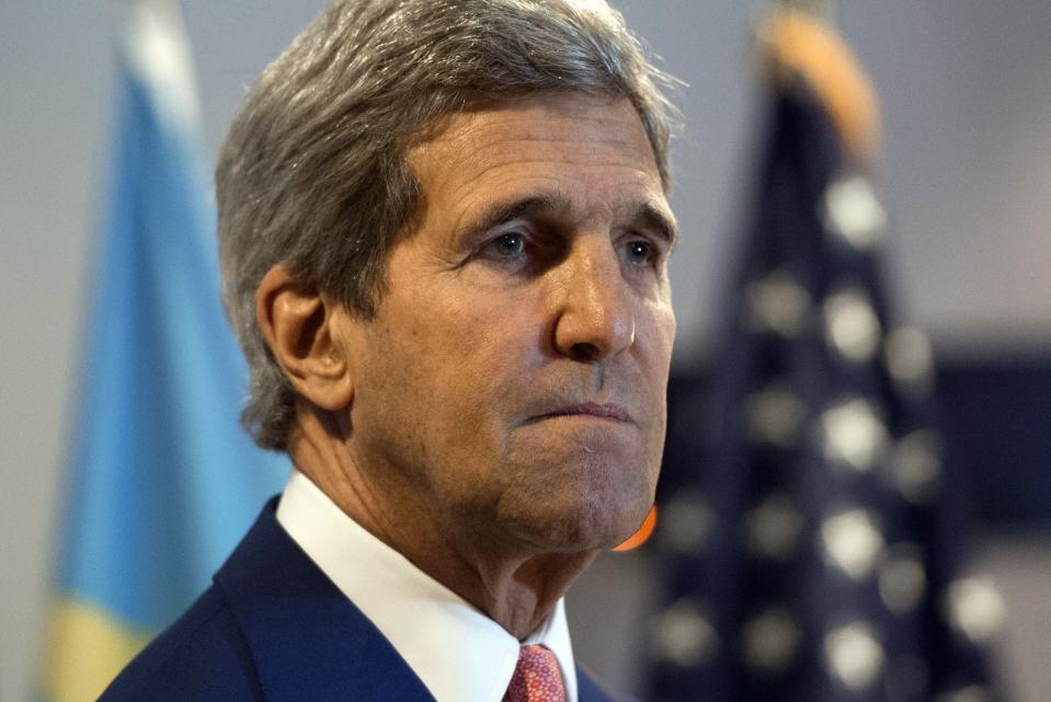 U.S Secretary of State John Kerry gives a press conference after meetings at the Palais de la Nation in Kinshasa, Democratic Republic of Congo, Sunday, May 4, 2014. The United States is ready to help fund the demobilisation of Democratic Republic of Congo's rebels, a senior US official said on May 3 as Secretary of State John Kerry arrived in the country on the latest leg of an Africa tour. "I can say categorically that we're ready to support them," the official said when asked if Washington was ready to back the government's demobilisation plan for some 12,000 rebels active in dozens of militias in the country's mineral-rich, restive east, a plan that's estimated to cost some 100 million dollars. (AP Photo/Saul Loeb, pool)