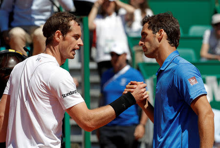 Tennis - Monte Carlo Masters - Monaco, 20/04/2017. Albert Ramos-Vinolas of Spain (R) shakes hands with Andy Murray of Britain after winning their match. REUTERS/Eric Gaillard