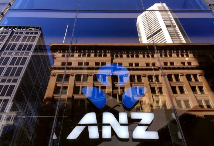 FILE PHOTO: The logo of the ANZ Banking Group is displayed in the window of a branch in central Sydney, Australia