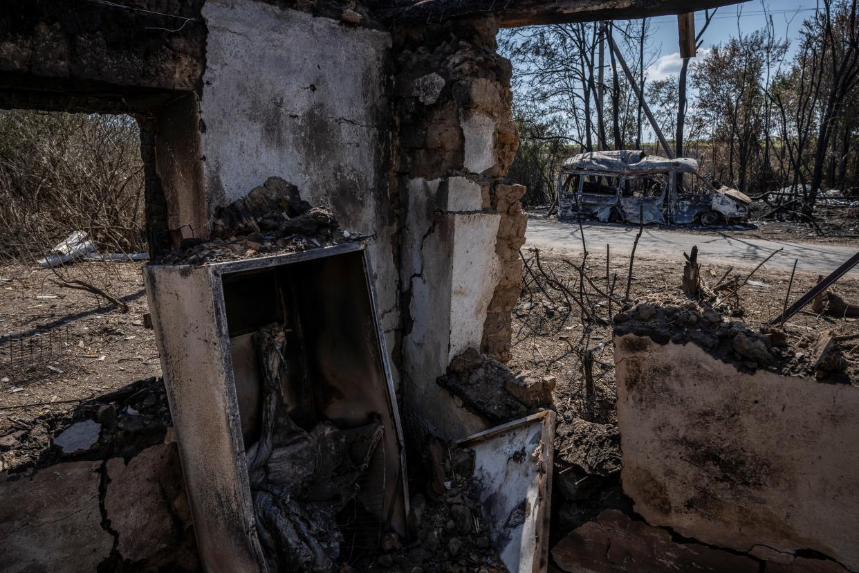 File photo: A destroyed car is seen from a destroyed building, as Russia’s attack on Ukraine continues, near the village of Robotyne (REUTERS)