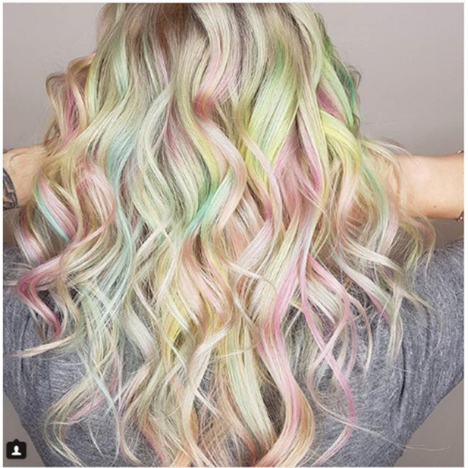 Pulp Riot colorist Kelly O'Leary-Woodford used a blonde base and a mixture of pastel yellows, pinks, and greens to create her version of opalescent hair.