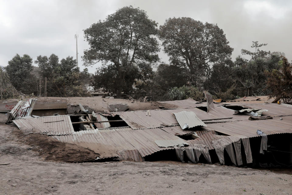 <p>The roof of a house covered in ash is seen after the eruption of the Fuego volcano in San Miguel Los Lotes in Escuintla, Guatemala, June 6, 2018. (Photo: Carlos Jasso/Reuters) </p>