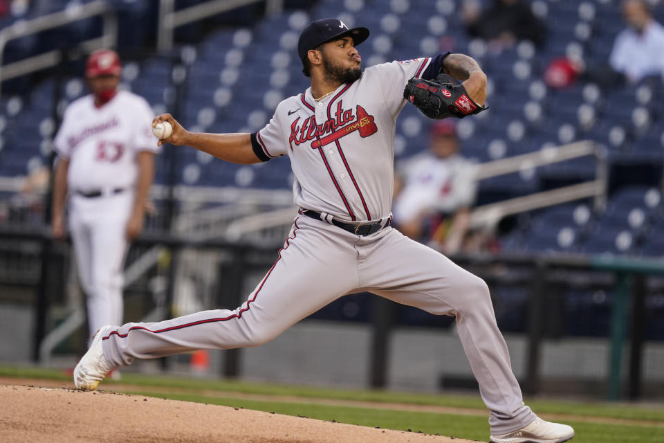 Atlanta Braves starting pitcher Huascar Ynoa throws during the first inning of baseball game against the Washington Nationals at Nationals Park, Tuesday, May 4, 2021, in Washington. (AP Photo/Alex Brandon)