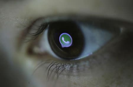 A picture illustration shows Whatsapp's logo reflected in a person's eye, in central Bosnian town of Zenica, March 13, 2015. REUTERS/Dado Ruvic