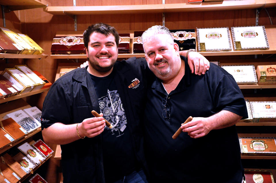 Michael and Mike Heidelman inside their bank vault humidor.