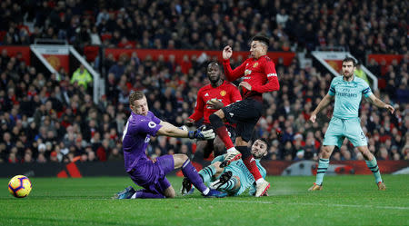 Soccer Football - Premier League - Manchester United v Arsenal - Old Trafford, Manchester, Britain - December 5, 2018 Manchester United's Jesse Lingard scores their second goal REUTERS/Darren Staples