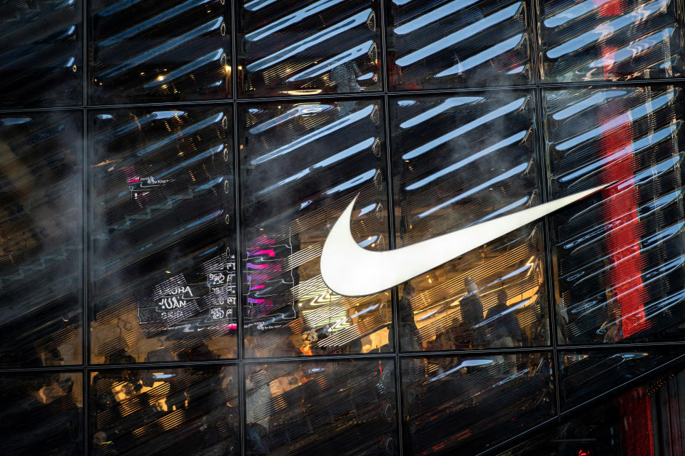 People visit the Nike store on Fifth Avenue during the holiday season in New York City, U.S., on December 9, 2022.  Reuters/Eduardo Munoz/file photo