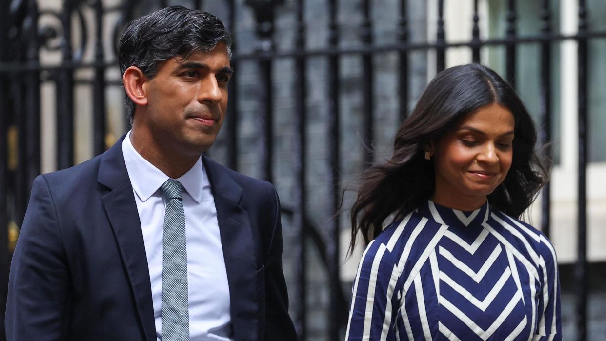 Rishi Sunak and his wife, Akshata Murty, leaving Downing Street