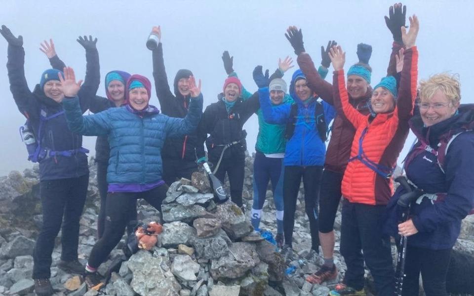 Team of 10 women, all aged between 40 and 60, celebrate as they reach the final peak of the 282 summits - The Veteran Women's Munro Relay/SWNS