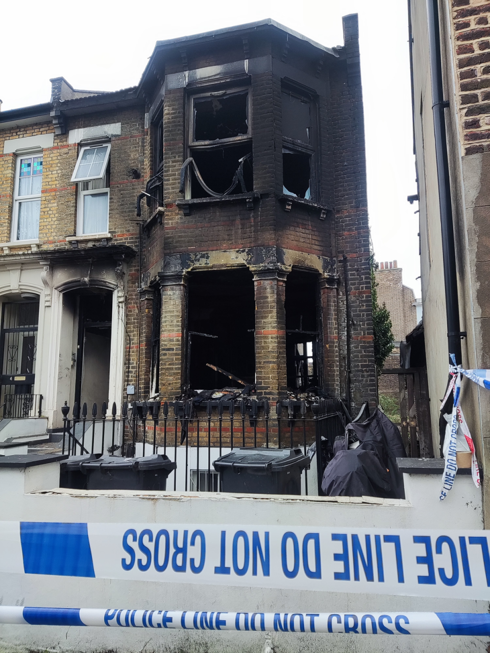 The burnt out flats in Hackney (Barney Davis/The Independent)