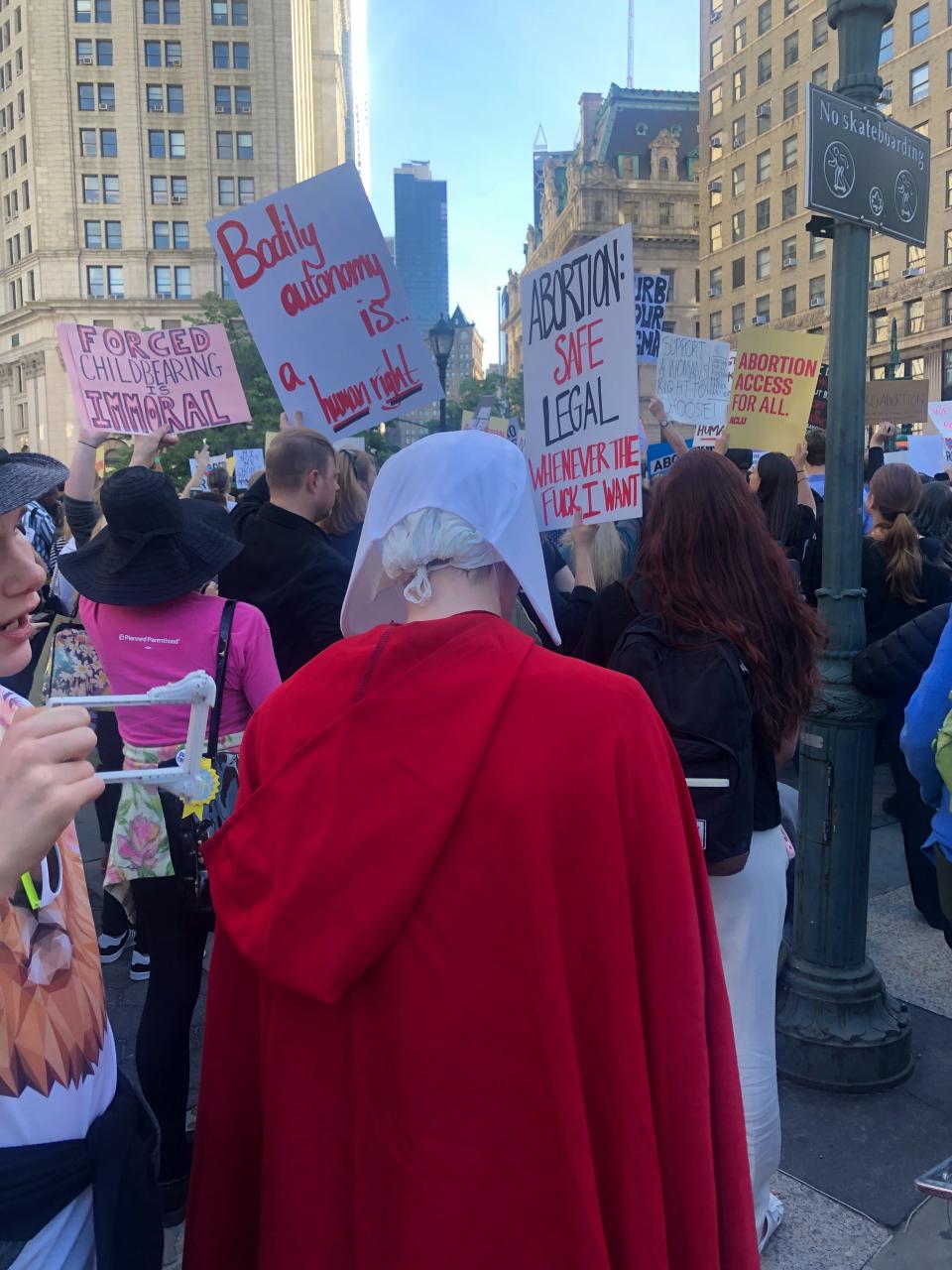 A protester dressed in a "Handmaid's Tale" outfit at the Foley Square #StopTheBans protest in New York City. (Photo: Emma Gray)