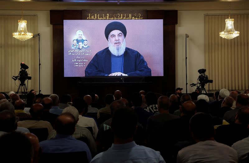 FILE PHOTO: Lebanon's Hezbollah leader Sayyed Hassan Nasrallah speaks during a televised address at a memorial service in Beirut's southern suburbs