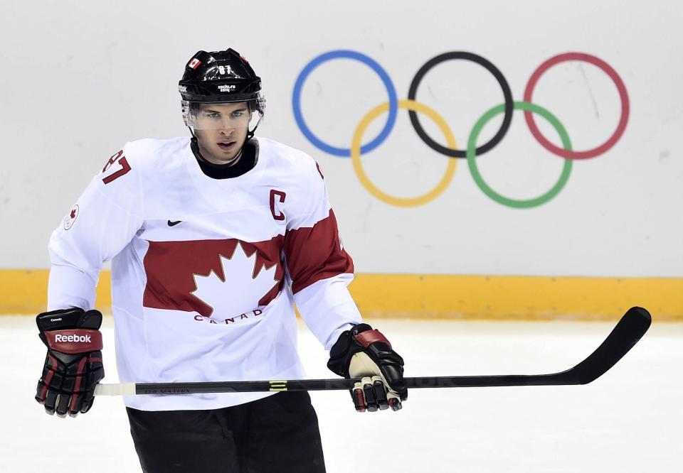 Canada's Sidney Crosby takes part in a warm-up ahead of quarterfinal hockey action against Latvia at the 2014 Sochi Winter Olympics in Sochi, Russia on Wednesday, Feb. 19, 2014. (AP Photo/The Canadian Press, Nathan Denette)