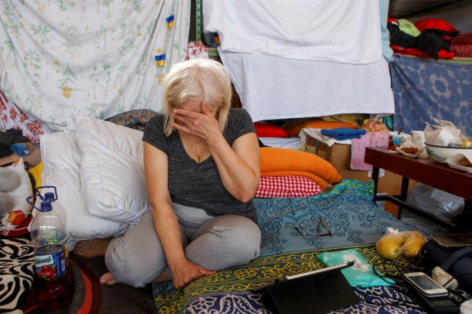 Nadiya Kyrylenko, from Luhansk, takes refuge at a school gym in Uzhgorod, Ukraine (Reuters)