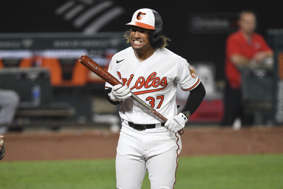 Baltimore Orioles' Jahmai Jones (37) reacts to strike out against Los Angeles Angels relief pitcher Junior Guerra during the fourth inning of a baseball game Tuesday, Aug. 24, 2021, in Baltimore. (AP Photo/Terrance Williams)