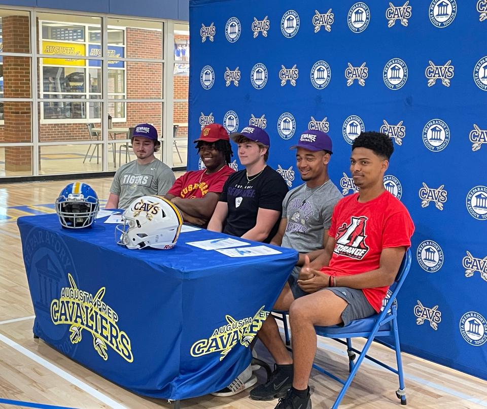 Augusta Prep football players sign national letters of intent to play college football. Left to right: Bryson Cronan, Emory Doss, Jack Rish, Solomon Willis and Tyon Waiters.