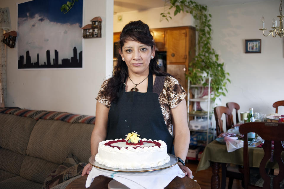 Ana Soria with a cake she made in March 2011. | Luis Eduardo Chimbo.