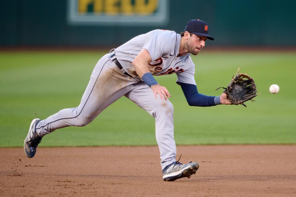 Detroit Tigers outfielder Matt Vierling (8) fields a ground ball against the Oakland Athletics during the first inning at Oakland Coliseum in Oakland, California, on Thursday, Sept. 21, 2023.