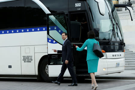 U.S. Senator Marco Rubio (R-FL) boards a Senate caravan bus from Capitol Hill to attend a North Korea briefing at the White House, in Washington, U.S., April 26, 2017. REUTERS/Yuri Gripas
