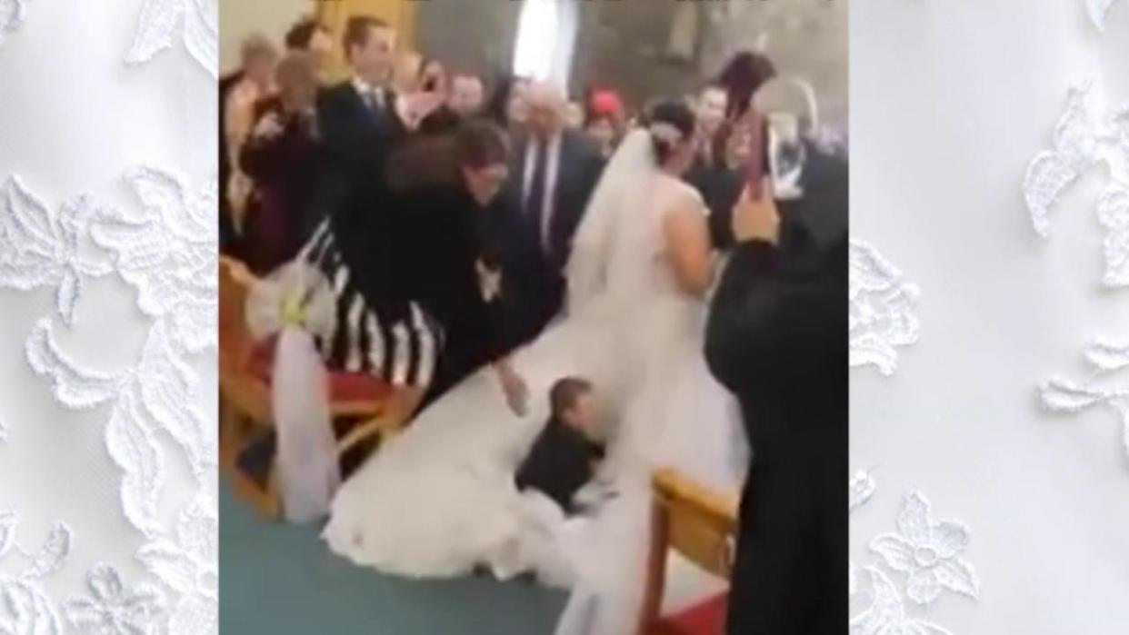 Here Comes the Dive! 4-Year-Old Launches Himself Onto Bride's Train