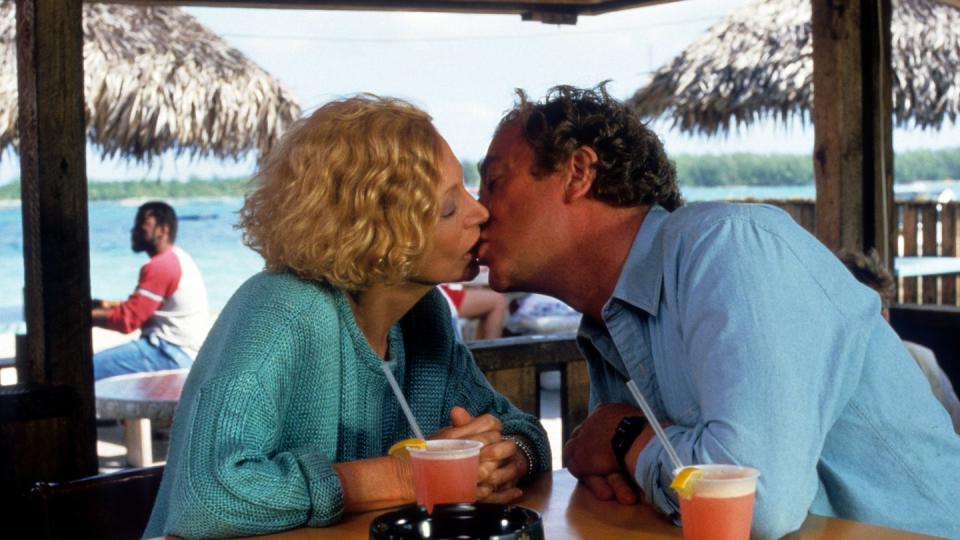 michael caine kissing lorraine gary during a scene while acting in jaws the revenge