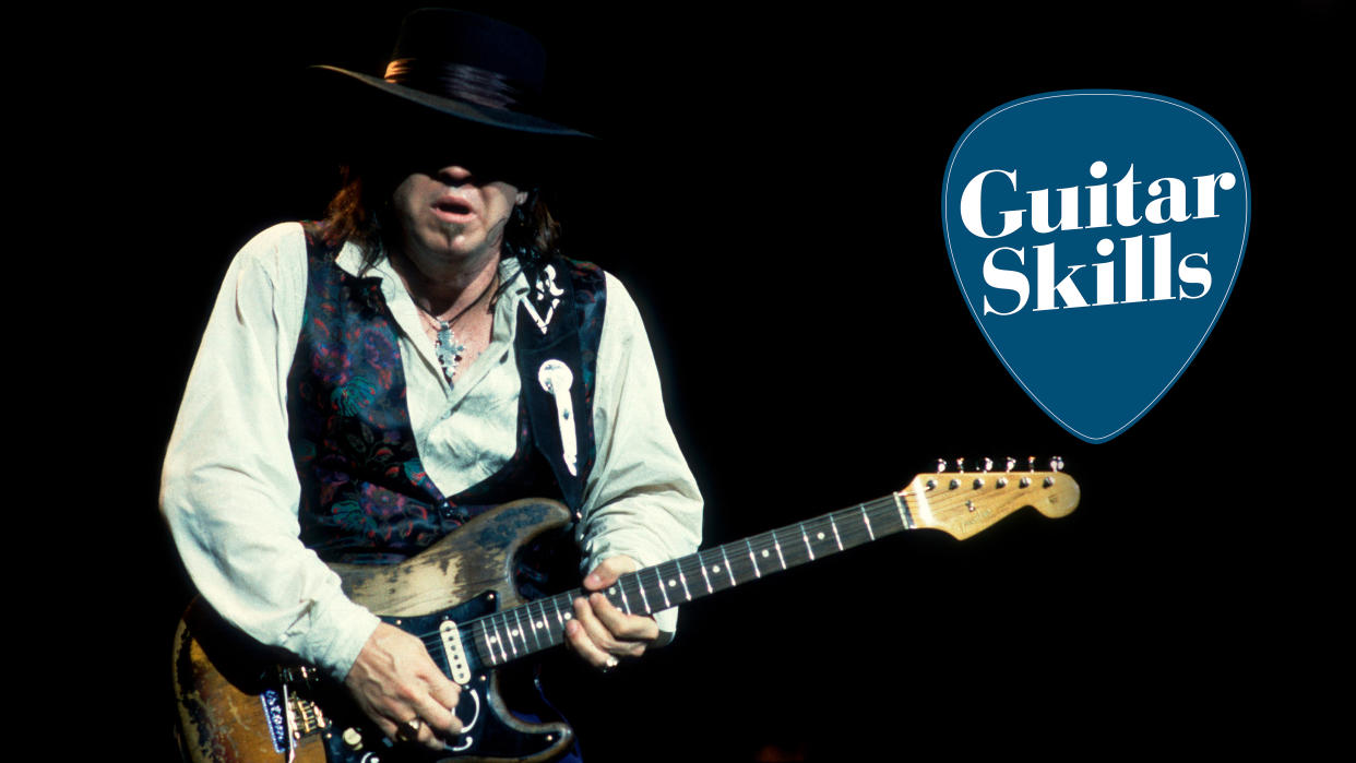  Stevie Ray Vaughan plays guitar as he performs onstage at the Alpine Valley Music Theater, East Troy, Wisconsin, August 25, 1990. 
