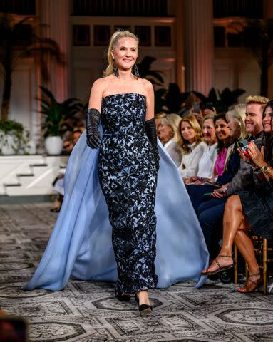 <p>Roy Rochlin/Getty</p> Cornelia Guest walks in designer Dennis Basso's show during New York Fashion Week