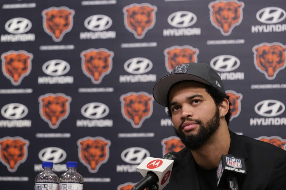 Chicago Bears No. 1 draft pick quarterback Caleb Williams listens to reporters during an NFL football news conference in Lake Forest, Ill., Friday, April 26, 2024. (AP Photo/Nam Y. Huh)