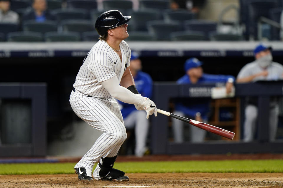 New York Yankee Luke Voit hits a seventh inning double in a baseball game against the Kansas City Royals, Tuesday, June 22, 2021, at Yankee Stadium in New York. (AP Photo/Kathy Willens)