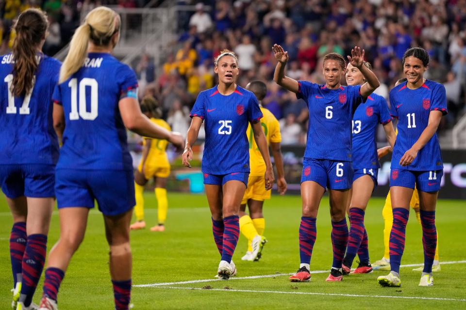 United States forward Lynn Williams (6) bows to midfielder Lindsey Horan (10) after an acrobatic assist in the first half of the Woman’s Soccer International Friendly match between the United States National Teams and the South Africa at TQL Stadium in Cincinnati on Thursday, Sept. 21, 2023. USA led 3-0 at halftime.