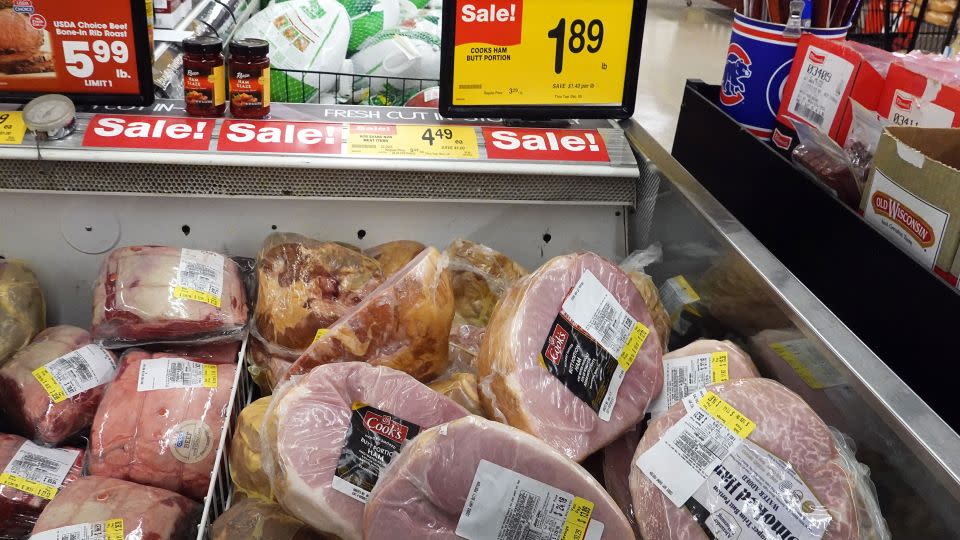 Hams are offered for sale at a grocery store ahead of the Thanksgiving Holiday on November 20, 2023 in Chicago, Illinois. - Scott Olson/Getty Images/File