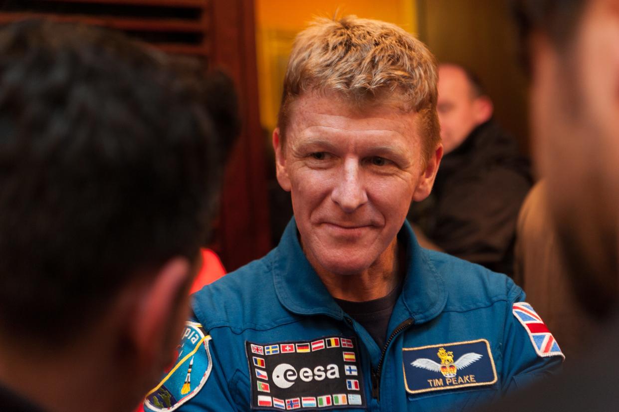 British ESA astronaut Tim Peake listens to a fan after attending "Experiments in space" at Usher Hall on October 17, 2016 in Edinburgh, Scotland.