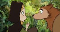 This image released by Apple shows Robyn Goodfellowe, voiced by Honor Kneafsey, left, and Mebh Óg Mactíre, voiced by Eva Whittaker, in "Wolfwalkers." (Apple via AP)