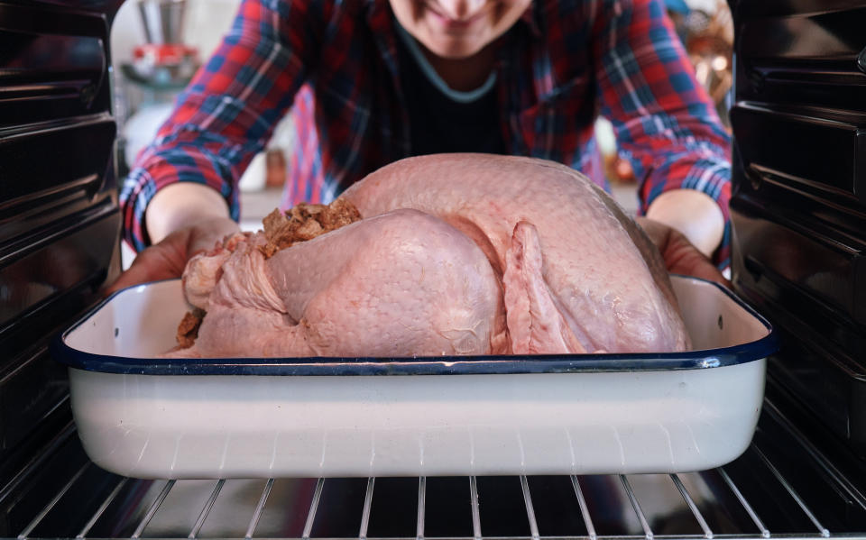 raw turkey in the oven