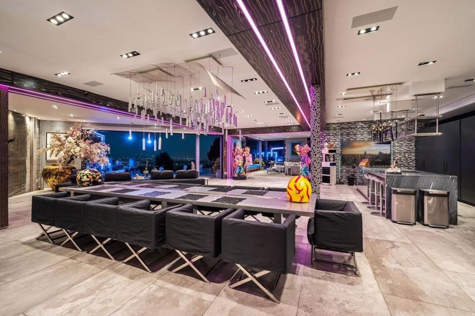 The kitchen and dining table in The Sunset View Mansion