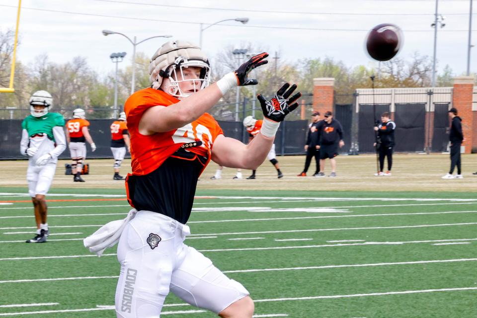 Josh Ford (40) runs drills during a Oklahoma State football practice, in Stillwater, Okla., on Tuesday, April 2, 2024.