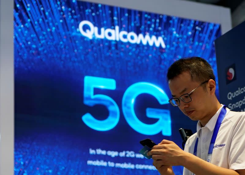 FILE PHOTO: Signs of Qualcomm and 5G are pictured at Mobile World Congress (MWC) in Shanghai