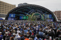 Crowds fill an area outside of the draft stage during the second round of the NFL football draft, Friday, April 26, 2024, in Detroit. (AP Photo/Carlos Osorio)