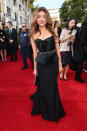 Golden Globes 2013: Sarah Hyland shone in a shimmering peplum black Max Azris Atelier gown © Getty