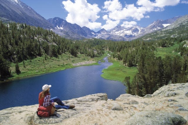 Woman sitting in the Mammoth Lakes in the summer