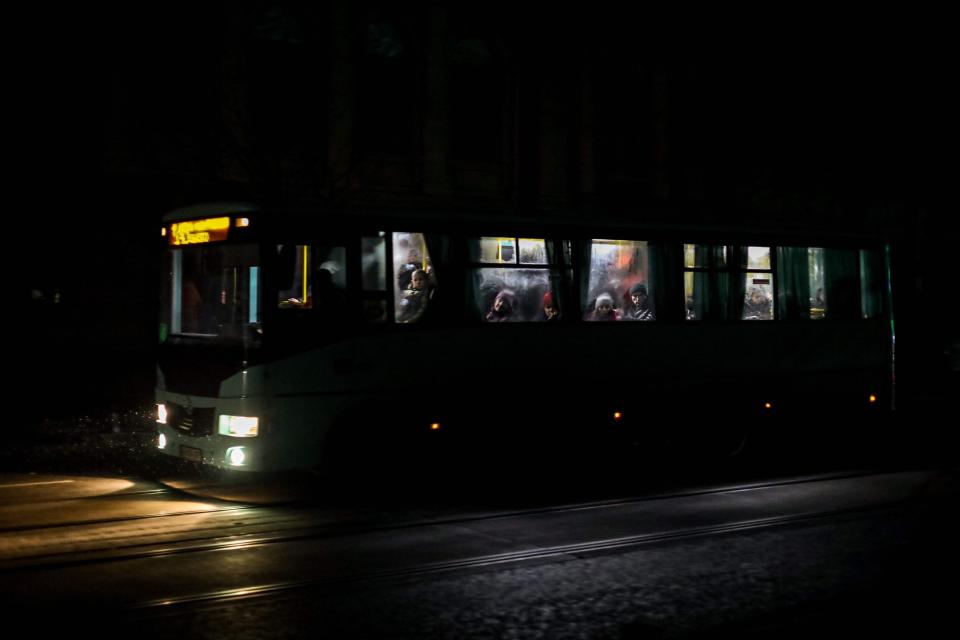 Passengers ride a bus during a blackout in downtown Odesa on Monday (AFP/Getty)