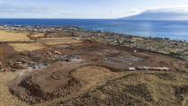 The construction progress at Ka La’i Ola, a 450-unit housing development aiming to provide relief and stable housing for wildfire victims, is pictured on Sunday, July 7, 2024, in Lahaina, Hawaii. The $115 million project is being funded by the state of Hawaii and the Hawaii Community Foundation. (AP Photo/Mengshin Lin)