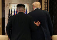 <p>President Donald Trump and North Korea’s leader Kim Jong Un leave after signing documents that acknowledge the progress of the talks and pledge to keep momentum going, after their summit at the Capella Hotel on Sentosa island in Singapore June 12, 2018. (Photo: Jonathan Ernst/Reuters) </p>