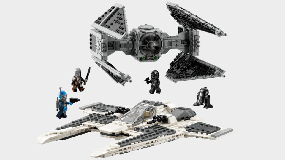 Lego Mandalorian Fang Fighter vs. TIE Interceptor set and box on a plain background