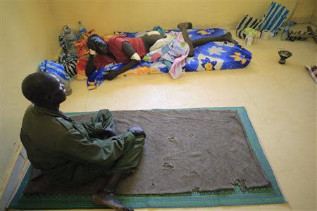 Wounded South Sudan military personnel undergo medical treatment at the general military hospital in the capital Juba December 28, 2013. REUTERS/James Akena