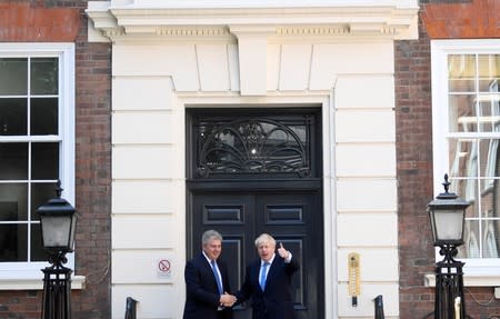 Boris Johnson arrives at the Conservative Party headquarters in London