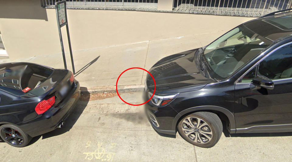 Pictured is Union Street in San Fransisco where old, faded red paint indicates a red zone.