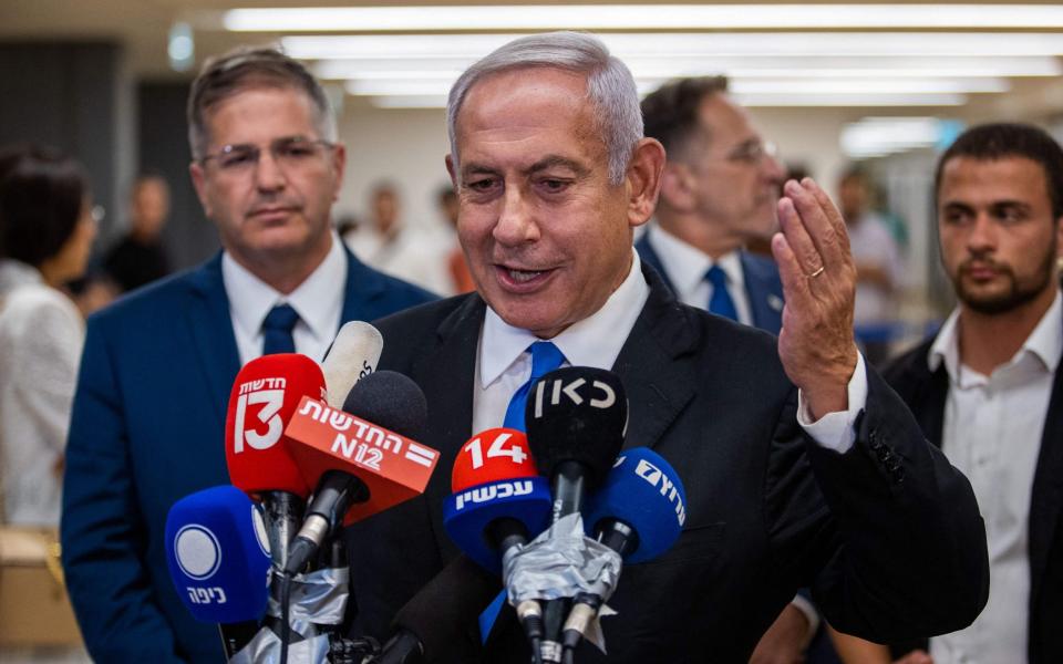 Netanyahu speaks to the press - OREN BEN HAKOON / AFP