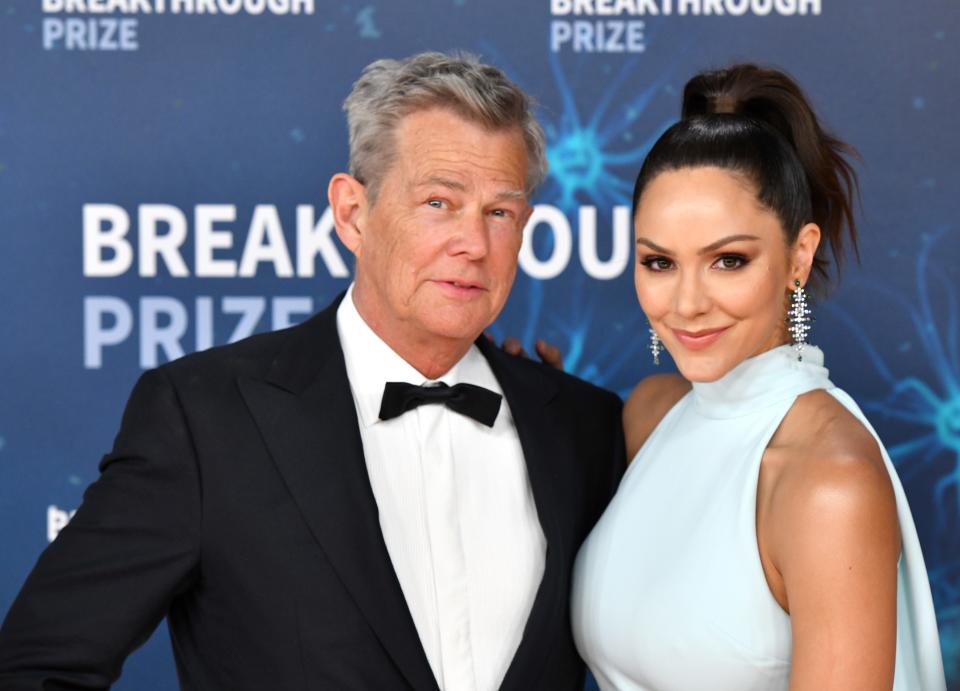 David Foster, left, and Katharine McPhee, right, pictured arriving at the Vanity Fair Oscar Party in 2020, are making headlines after the 16-time Grammy winner said his wife was "fat" during her time on "American Idol" where they first met.