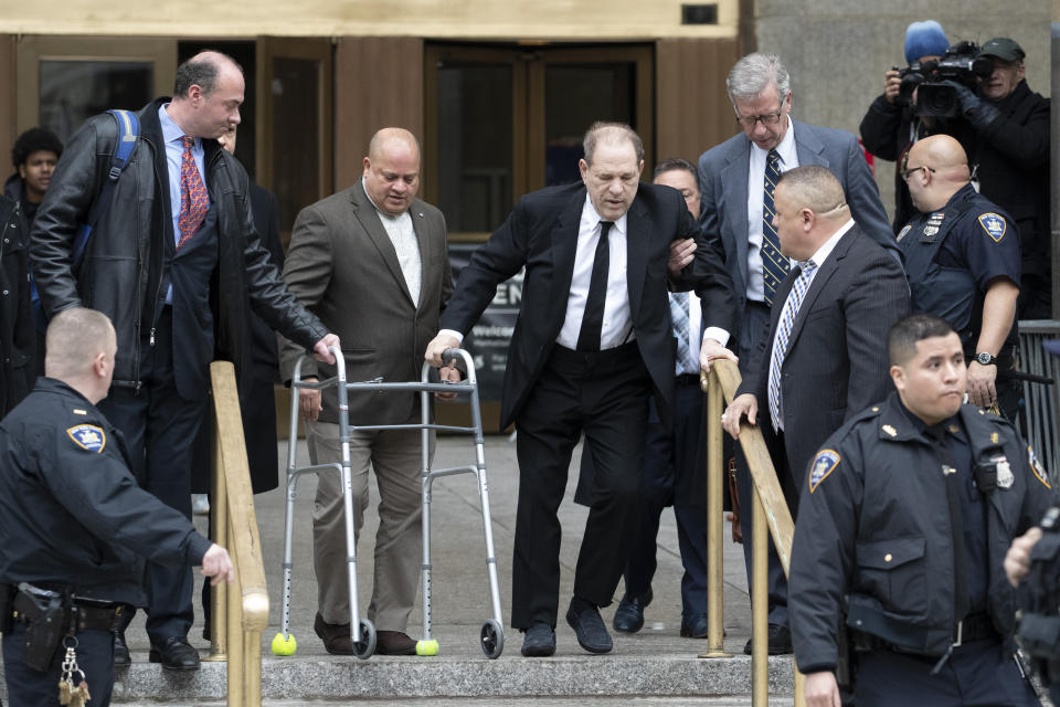 Harvey Weinstein, center, leaves court following a pre trial hearing, Monday, Jan. 6, 2020, in New York. The disgraced movie mogul faces allegations of rape and sexual assault. (AP Photo/Mary Altaffer)